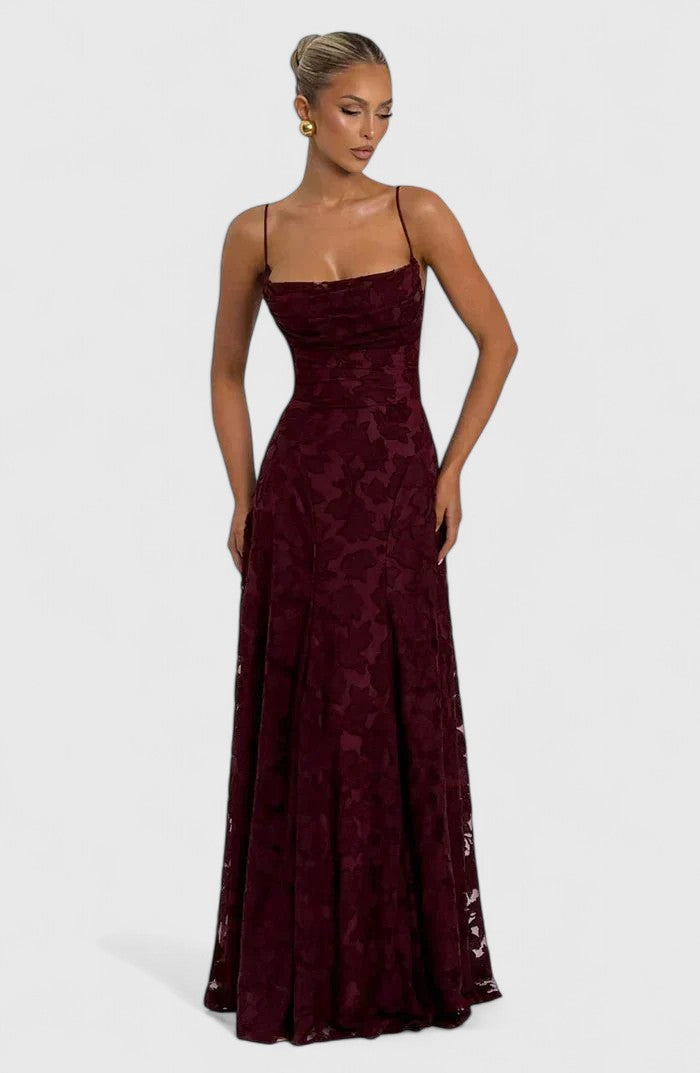 Flowy women's summer maxi dress, elegant style with a flattering open back. Perfect occasion wear.