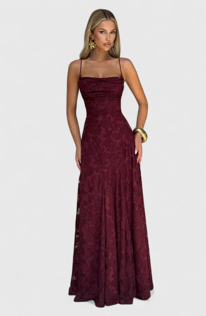 Women's elegant cowl neck maxi dress with a striking open back. Flowy for chic party wear.
