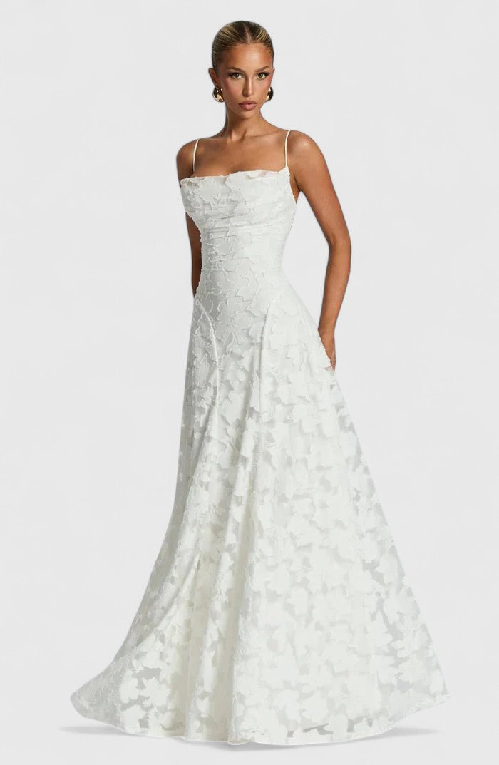 Flowy maxi dress for women featuring an elegant open back & delicate lace-up. Perfect evening wear.