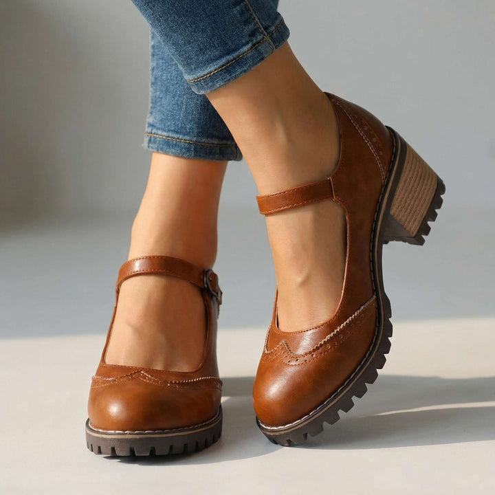 Pair of women's versatile T-strap closed-toe heels. Classic fashion footwear offering all-day comfort.