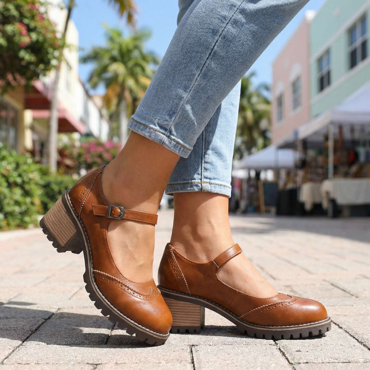 Supportive women's T-strap closed-toe block heels, perfect for work & events. Offers all-day comfort.