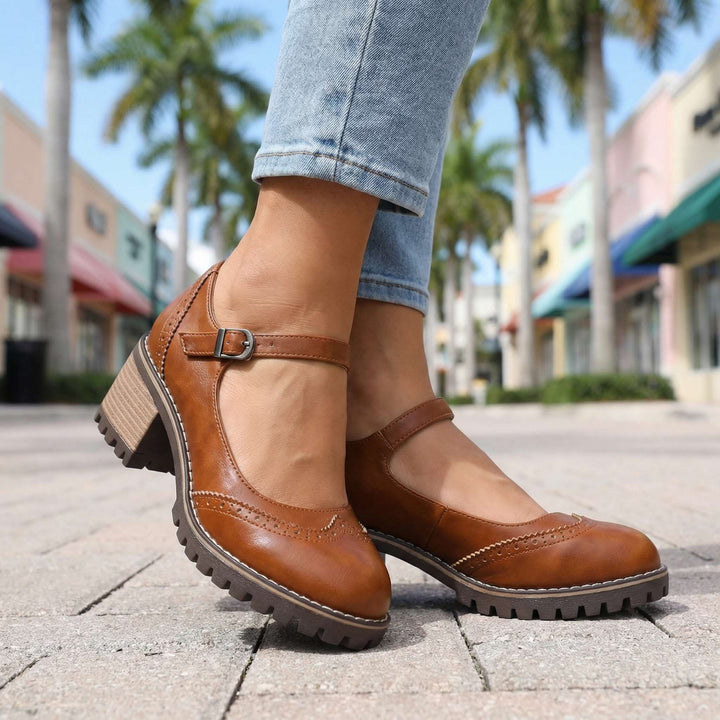 Fashionable women's T-strap closed-toe heels with a sturdy block heel. Designed for comfort & elegance.