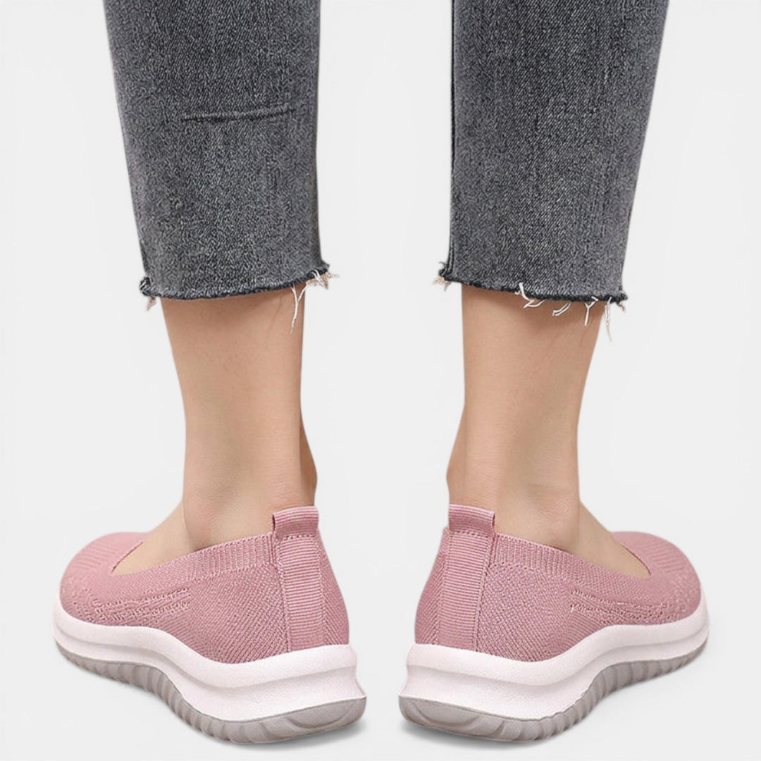 Supportive women's orthopedic walking sneakers, providing breathable comfort for casual everyday wear.