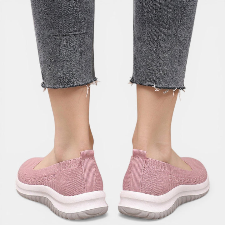 Supportive women's orthopedic walking sneakers, providing breathable comfort for casual everyday wear.