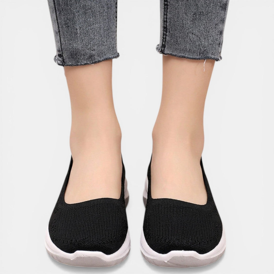 Women's comfort slip-on sneakers, featuring orthopedic support for pain relief & easy wear on the go.