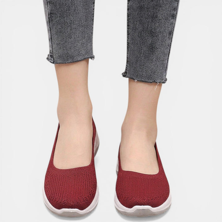 Orthopedic slip-on sneakers for women, offering breathable comfort & excellent support for walking.