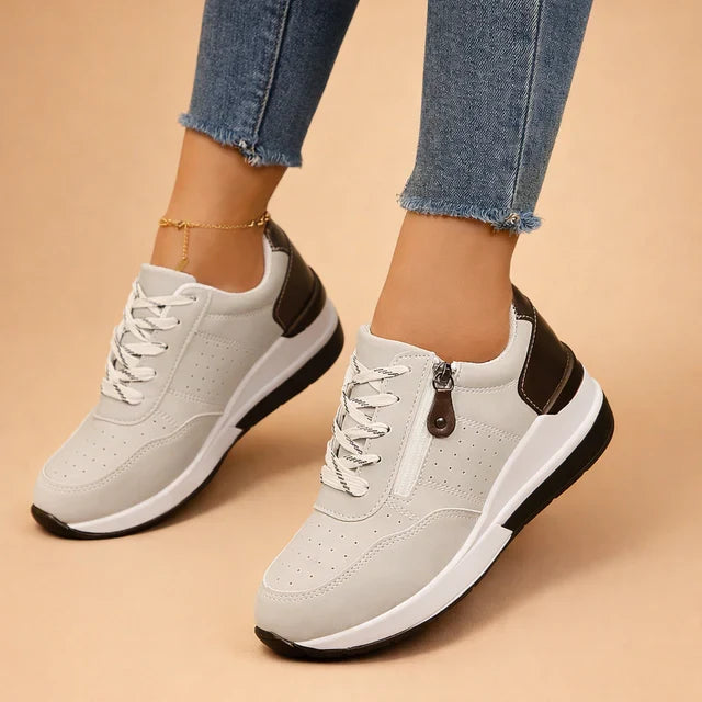Women's low-top cushioned sneakers for everyday comfort and casual style.