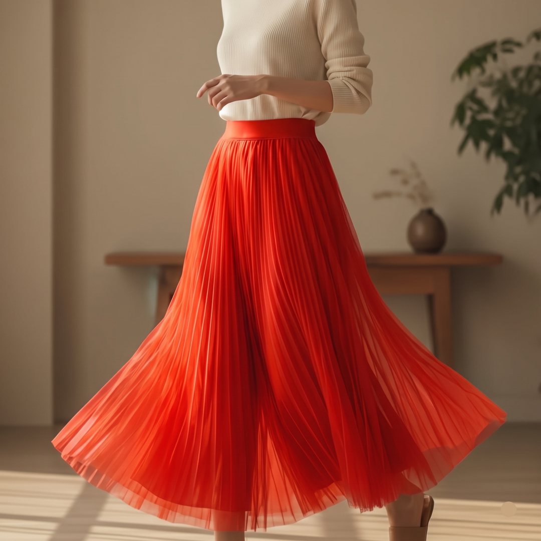 Women's high-waisted pleated A-line midi skirt, perfect for elegant or casual chic outfits.