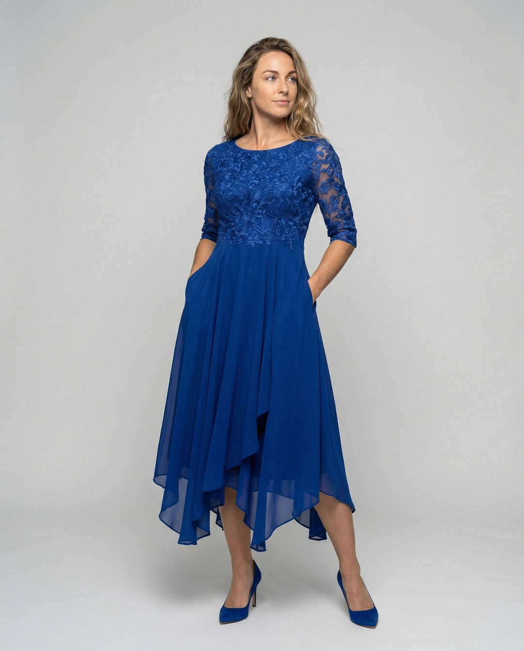 Elegant mid-length women's wedding guest dress. Formal, flowy, and perfect for special occasions.
