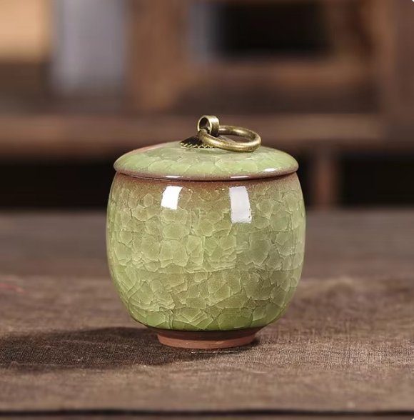 Craquelé glaze ceramic urn, a dignified home decor piece and memorial for beloved pet ashes.