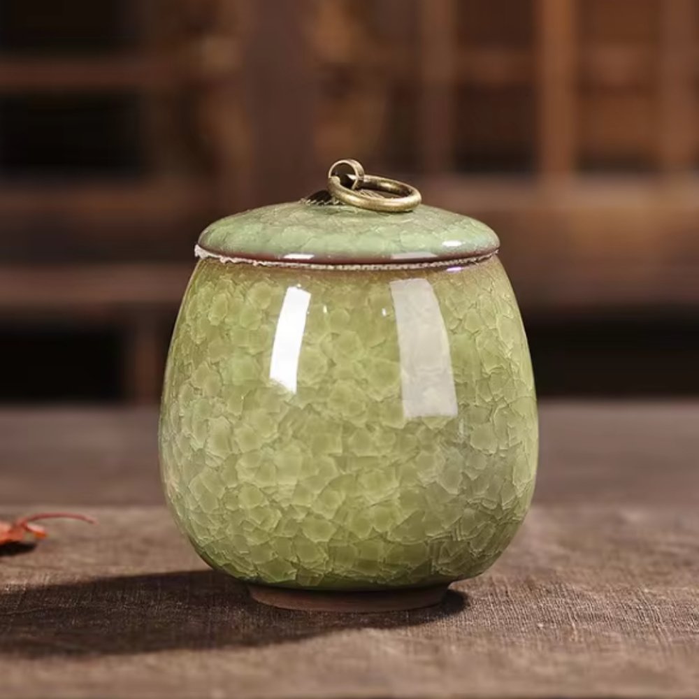 Artisan ceramic pet urn featuring beautiful craquelé glaze, a special resting place for ashes.