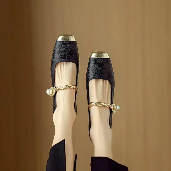 Women's elegant Mary Jane shoes with a distinctive braided pearl strap and block heel.
