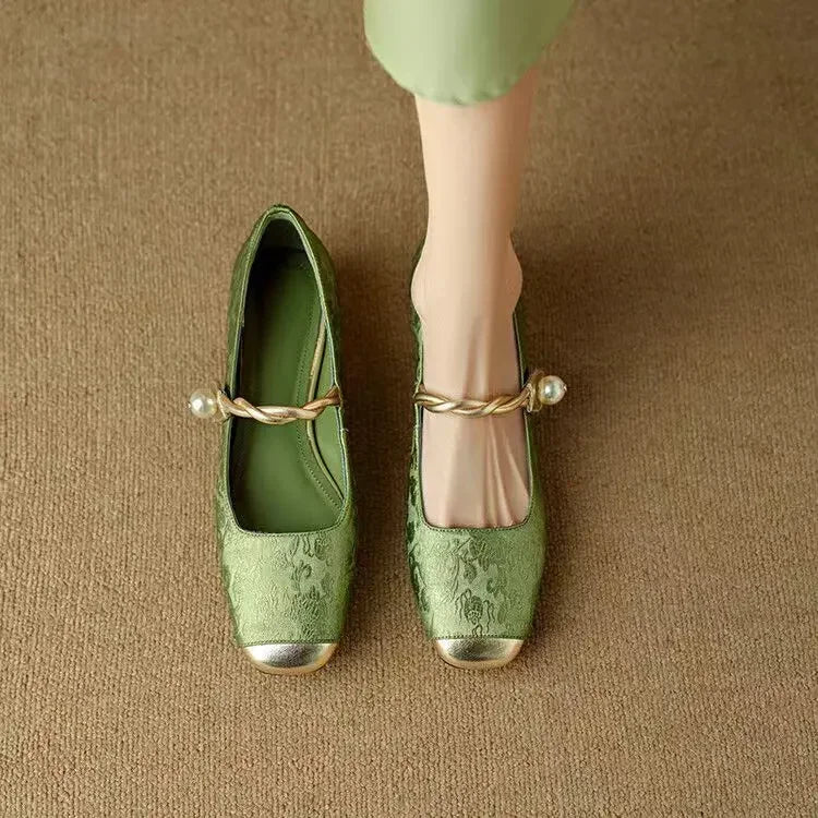 Elegant women's footwear: Vintage Mary Jane shoes with shimmering braided pearl strap.