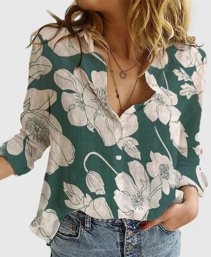 Relaxed fit women's elegant button-down blouse with lapel collar, offering versatile style for any look.