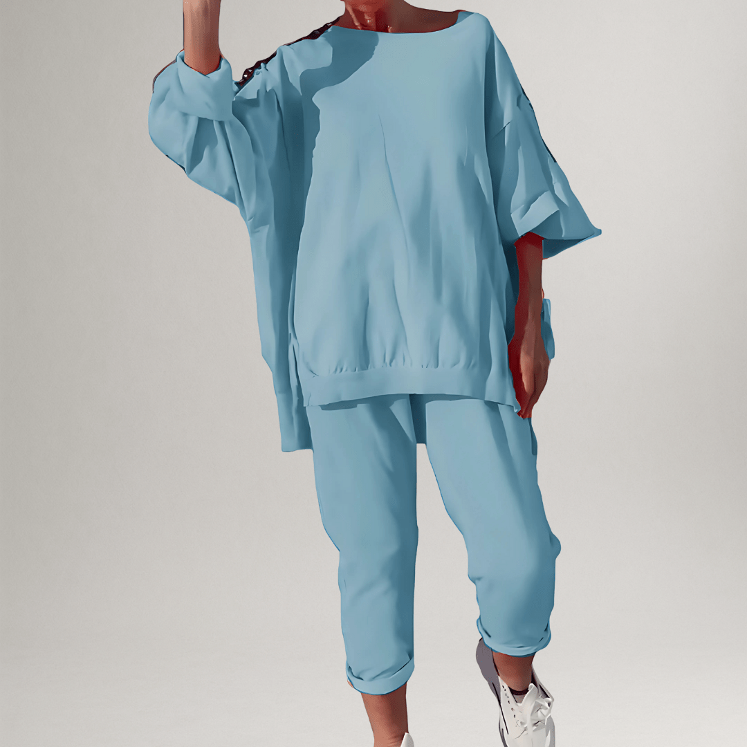 Close-up of the soft fabric oversized blouse from the women's two-piece set, featuring a classic, elegant style.