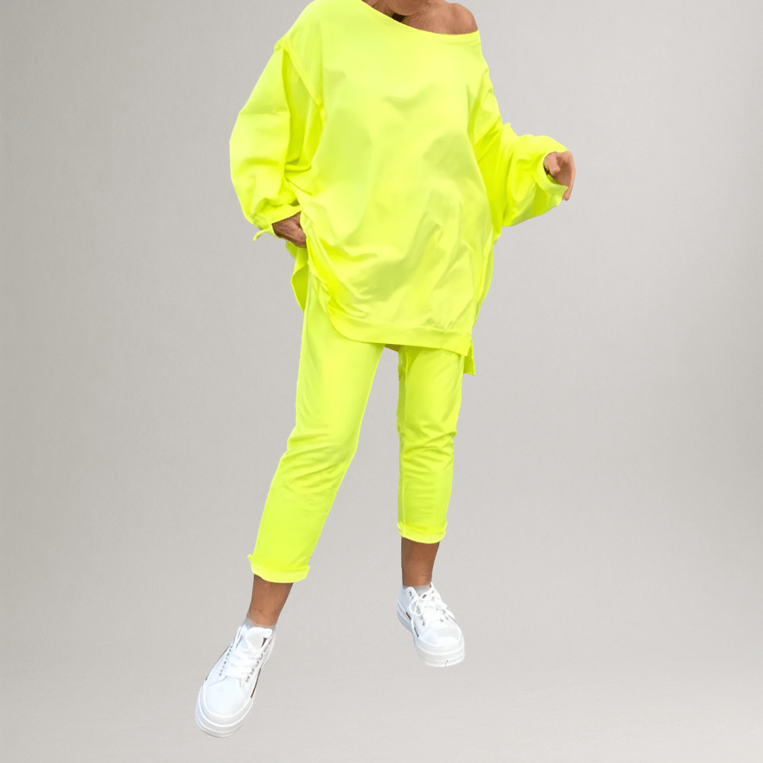 Back view of the women's oversized blouse & wide-leg trouser set, highlighting the relaxed fit & sophisticated silhouette.