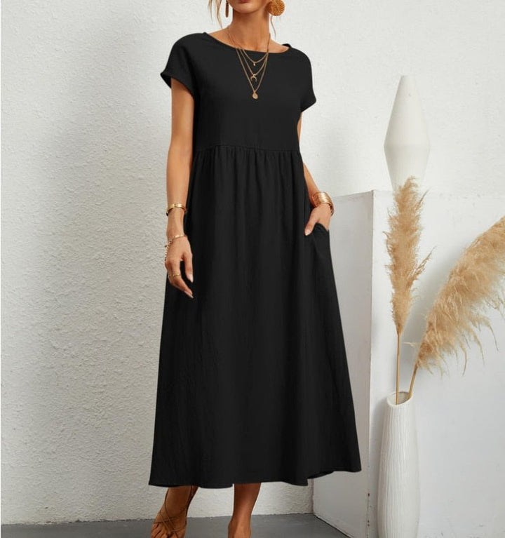 Elegant women's flowy maxi summer dress, offering breathable comfort for warm weather.
