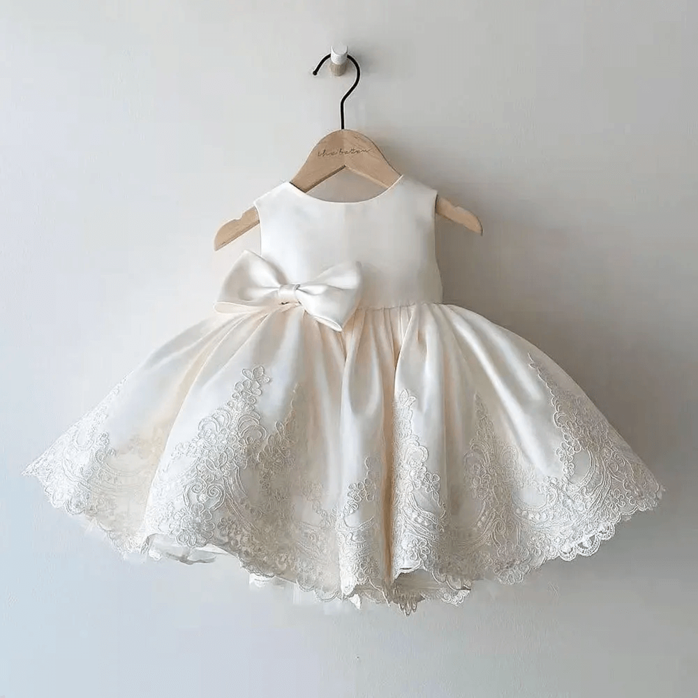 Girls' elegant Aurora princess dress with delicate lace & bow, perfect for special occasions, parties & birthdays.