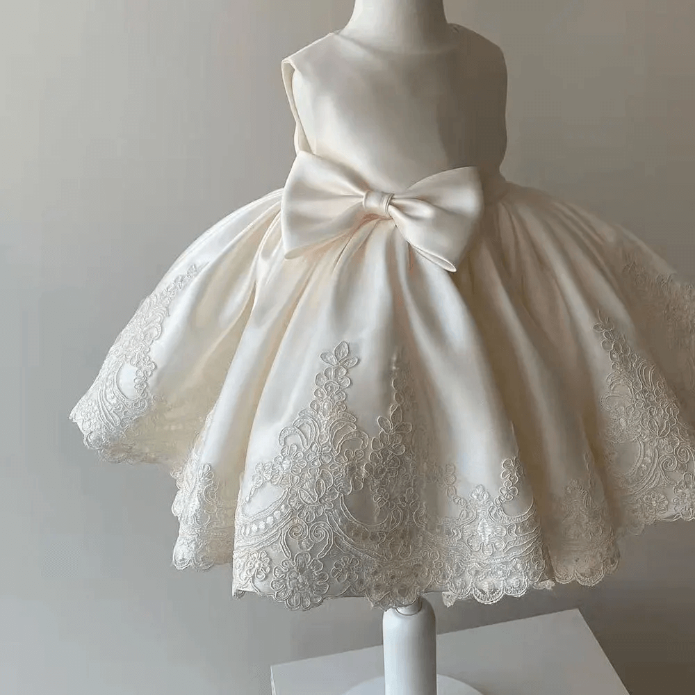 Luxurious toddler girl Aurora princess dress with lace bow, ideal for formal events, weddings & celebrations.