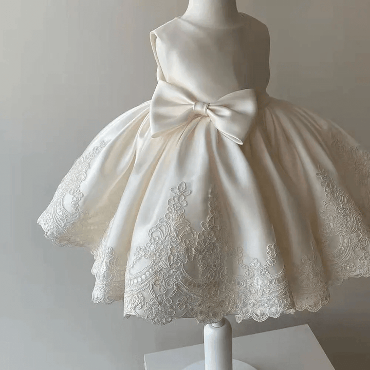Luxurious toddler girl Aurora princess dress with lace bow, ideal for formal events, weddings & celebrations.