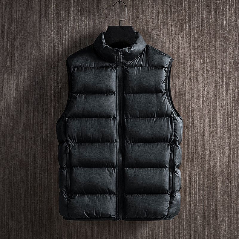 Stylish men's quilted puffer vest for winter, a warm and lightweight sleeveless outerwear piece for modern layering.
