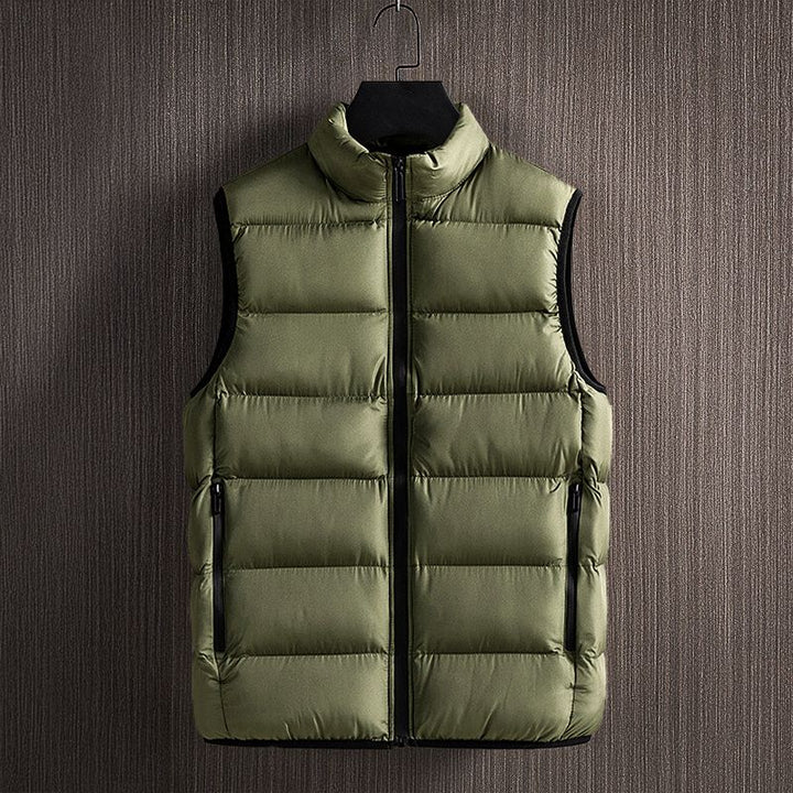 Classic men's quilted puffer vest with sleek design, perfect sleeveless outerwear for casual warmth & layering.