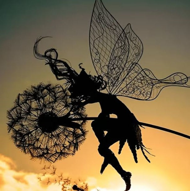 Graceful steel sculpture of a fairy playing on a dandelion enhances garden charm. Outdoor decorative art. Weather-resistant.