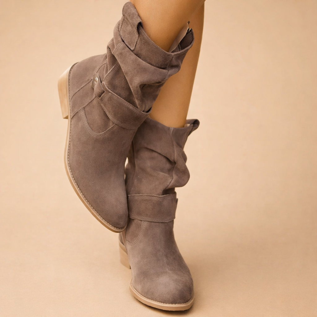 Elegant women's ankle boots featuring a slouch design and buckle accents. Versatile for winter & fall fashion.