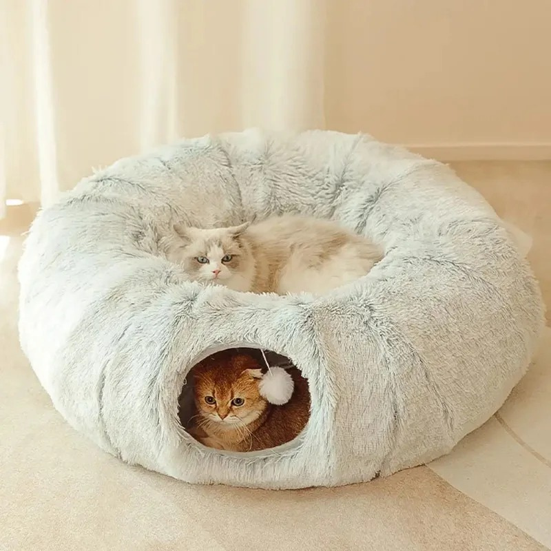 Gray plush cat tunnel and cozy pet bed for interactive play and comfortable rest. Cat hideaway toy for endless fun.
