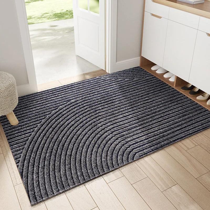 "Green non-slip heavy-duty door mat with textured surface for indoor/outdoor use, resists dirt, rain, and sun exposure."