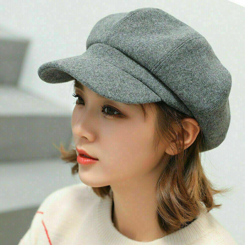 Chic women's vintage balloon hat, offering a retro look and warm cotton comfort for winter outfits.