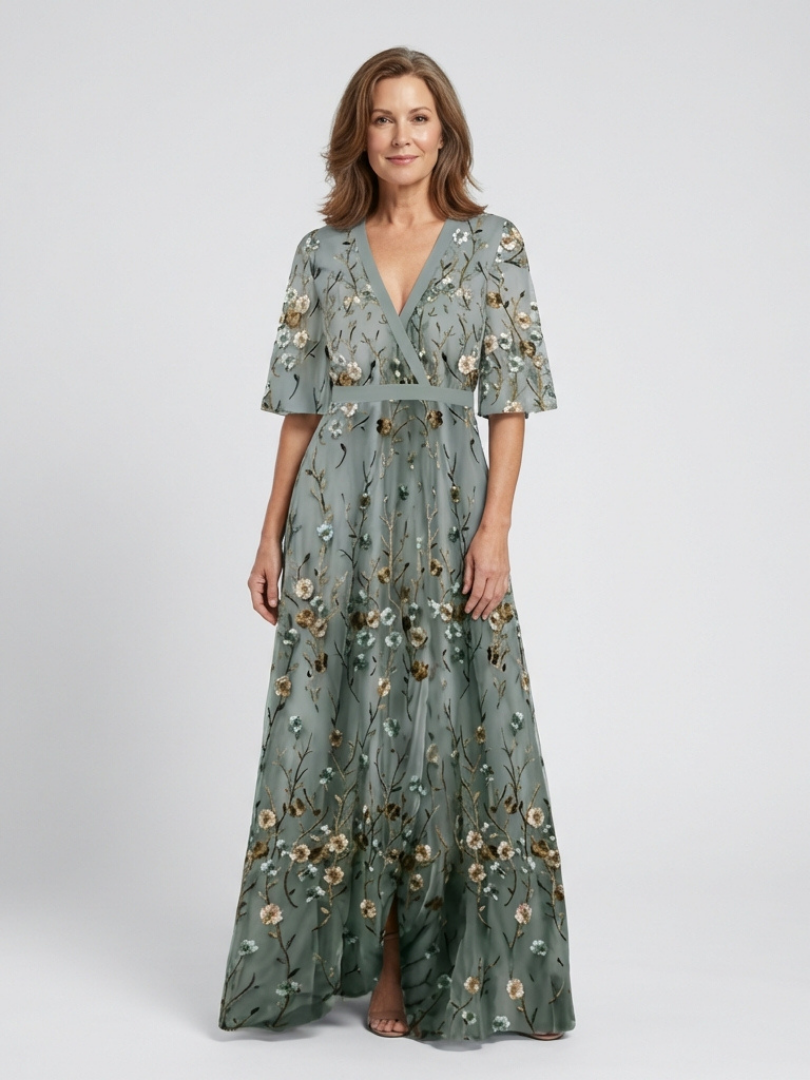 Women's green floral V-neck short sleeve maxi dress. Elegant spring/summer evening wear.