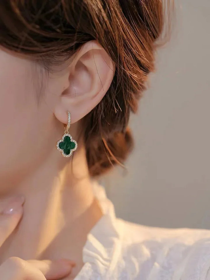 Timeless women's gold-plated clover earrings with brilliant crystals, an elegant choice for any occasion.