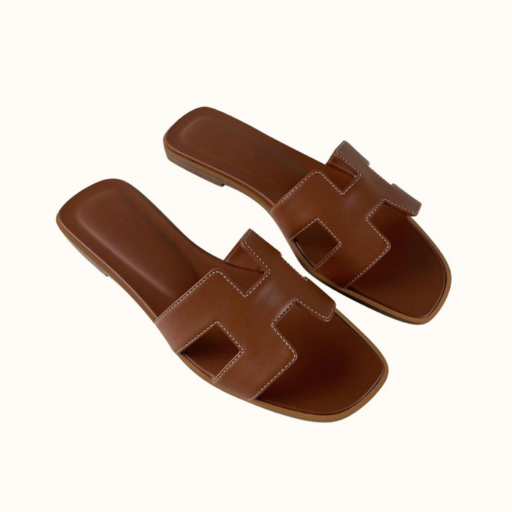 Elegant women's slip-on H-strap open-toe sandals, perfect for stylish summer casual or dressy occasions.