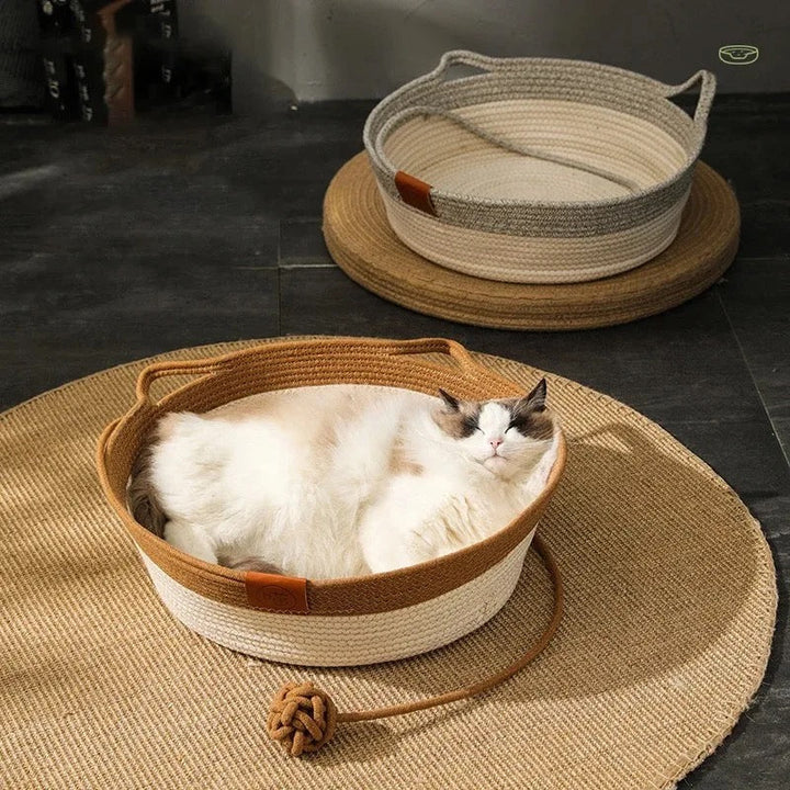 Hand-woven rattan cat bed & scratcher combo, perfect for feline comfort & play. Durable, stylish pet furniture.