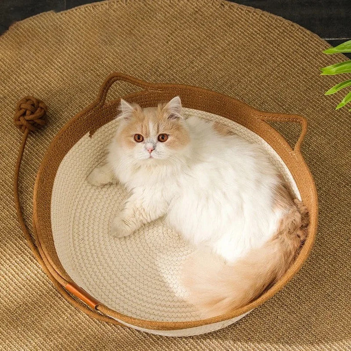 Eco-friendly rattan cat bed, a cozy pet lounge and durable scratcher for comfortable feline relaxation.
