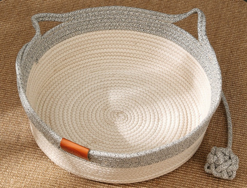Round hand-woven rattan cat bed with scratcher, providing a cozy pet lounge for your feline friend to relax.