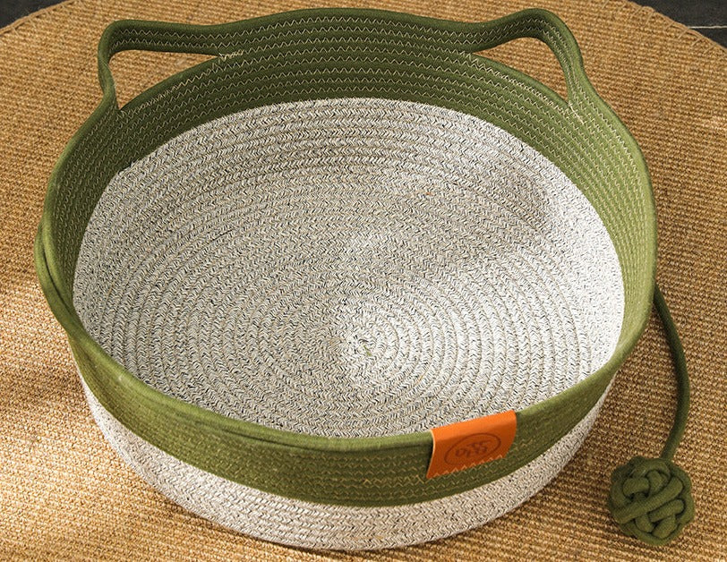 Cozy hand-woven rattan cat bed and scratcher, offering a comfortable pet lounge for your beloved feline companion.