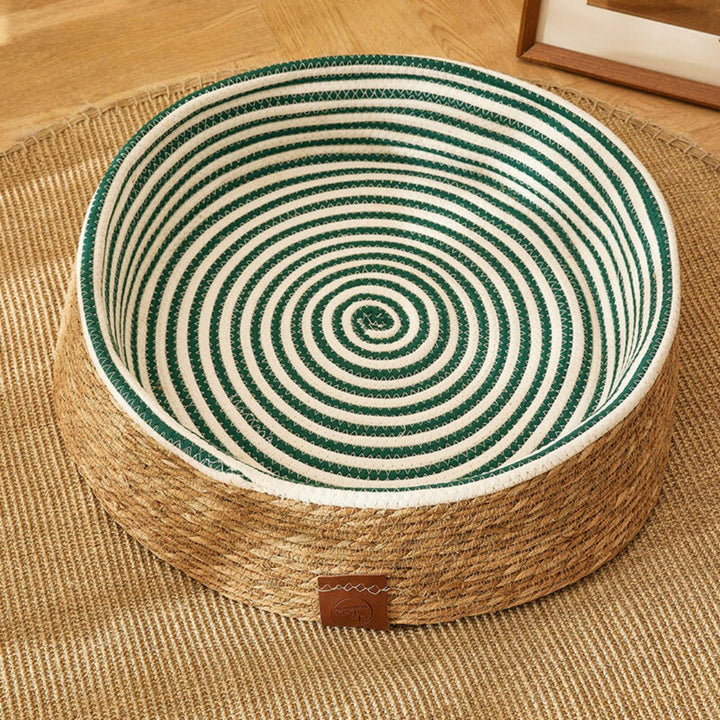 Durable hand-woven rattan cat scratching bed. Natural pet furniture offers comfort & a perfect scratch surface.