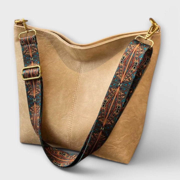 Classic faux leather shoulder bag for women, an elegant vintage handbag ideal for daily fashion.