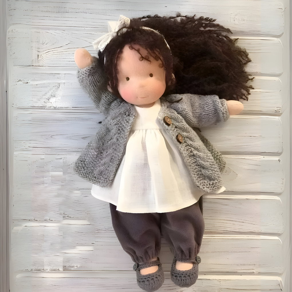 Handmade Waldorf doll, a gentle and soft plush toy, ideal for thoughtful gifts.