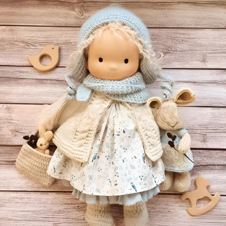 Handmade Waldorf doll, natural materials, a plush and soft companion for creative play.