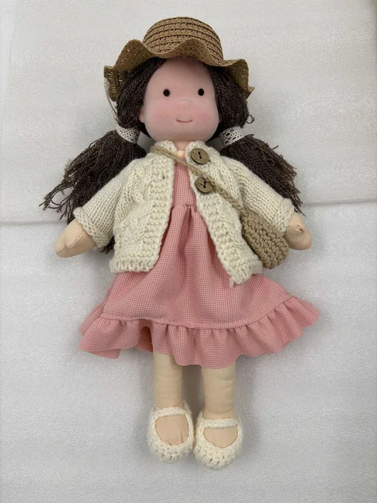 Charming handmade Waldorf doll, a soft natural fabric toy, durable gift for children's imaginative play & comfort.