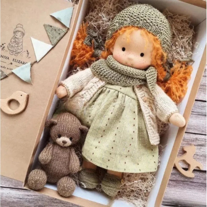 Adorable handmade Waldorf doll, soft cotton, perfect for a child's collection.