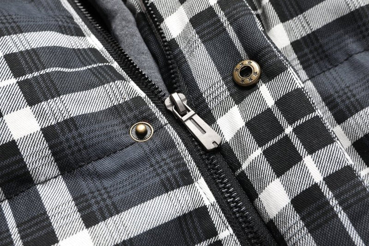 Classic plaid pattern on a men's hooded puffer vest. Warm, quilted, and perfect for winter style.