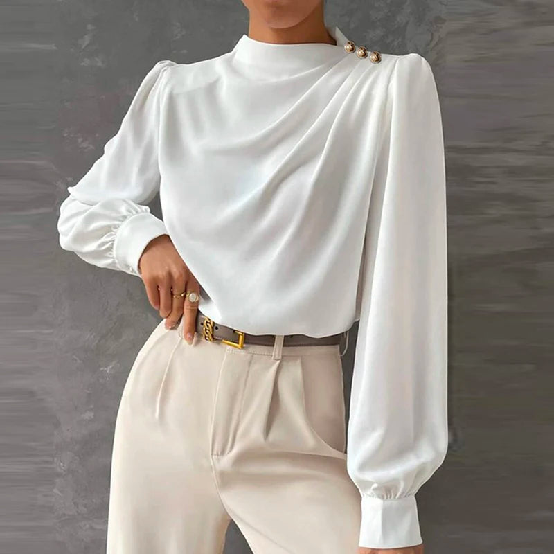 Elegant women's blouse with a high neck and long sleeves. Relaxed fit top, perfect for chic fashion looks.