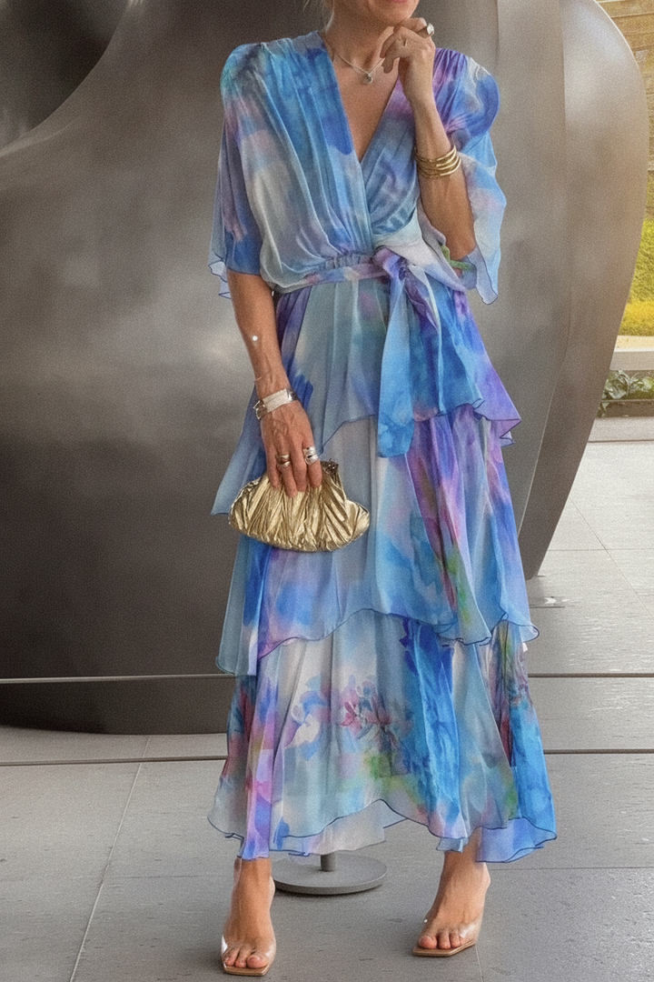 Elegant women's layered bohemian maxi dress with a draped silhouette, perfect for garden parties or summer occasions.