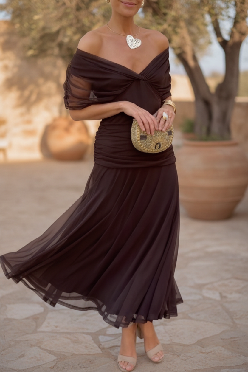 Elegant women's drape dress for wedding guests & special occasions. Flowy, sophisticated party wear.