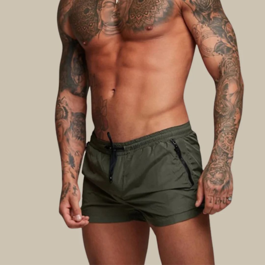 Men's comfortable quick-dry swim trunks, essential summer swimwear for beach days and poolside relaxation.