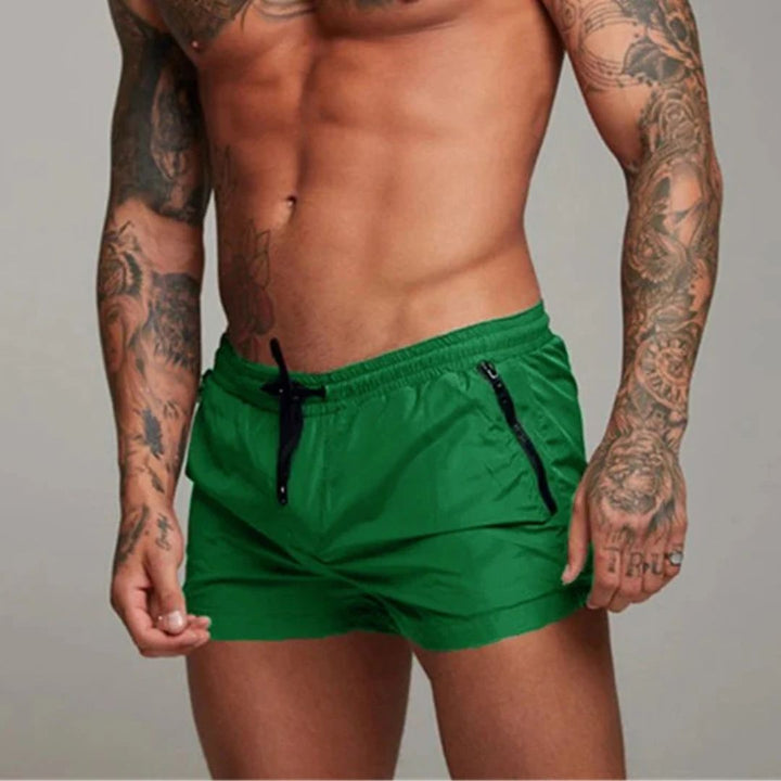Quick-dry men's swim trunks in a modern style for ultimate comfort & versatility at the beach or pool.
